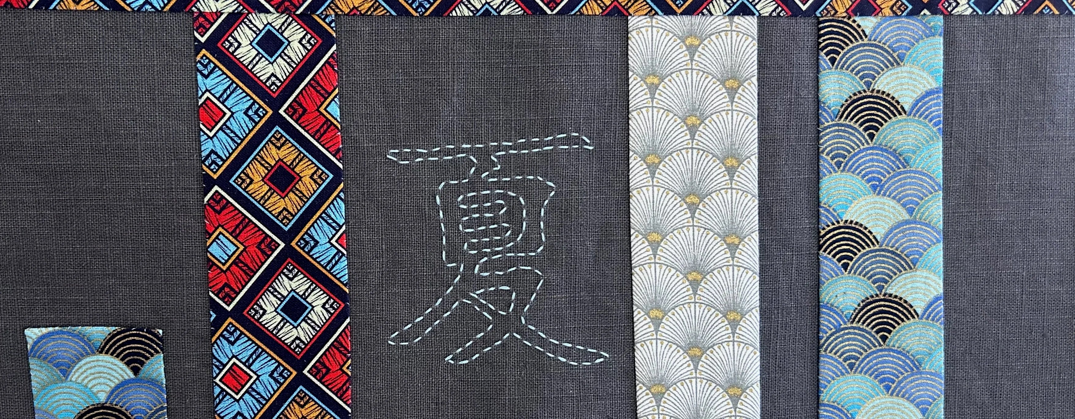 détail tenture et broderie